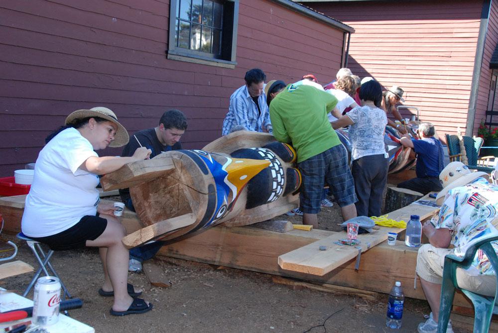 Community members gather to paint <em>Hosaqami</em>.