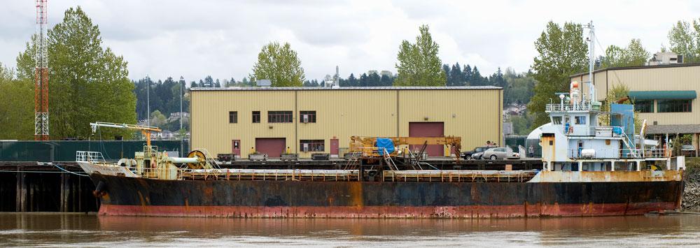 Evan Lee From <em>Migrant Ship Re-creation Project (in progress): Reference Photograph, Seized Migrant Ship, Annacis Island, Delta, BC </em> 2011 