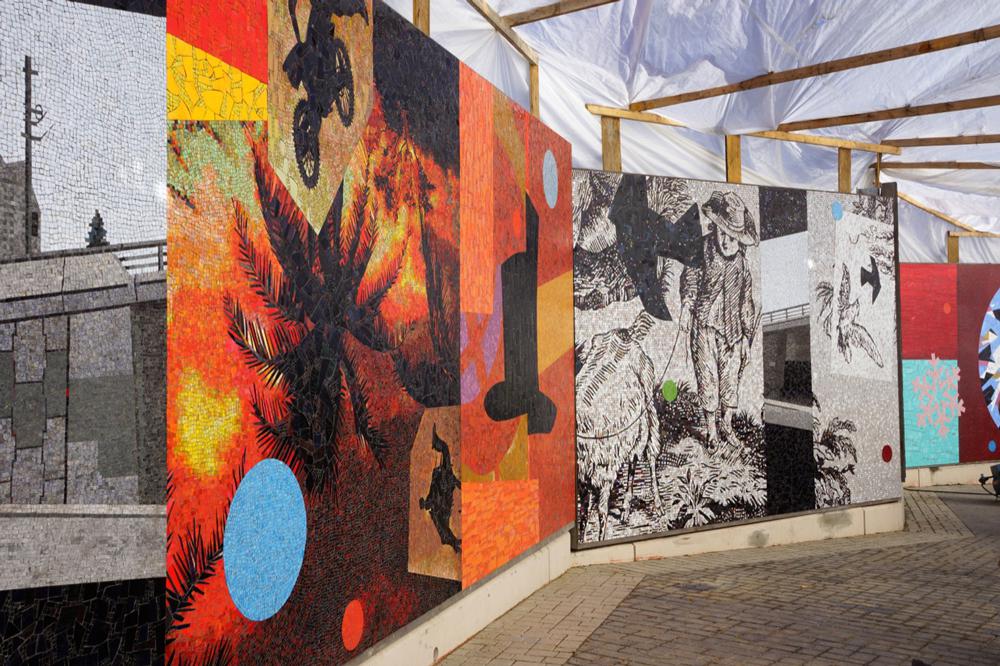 An in-progress view of Ron Moppett’s mosaic mural <em>THESAMEWAYBETTER/READER</em> / photo Kevin Baer