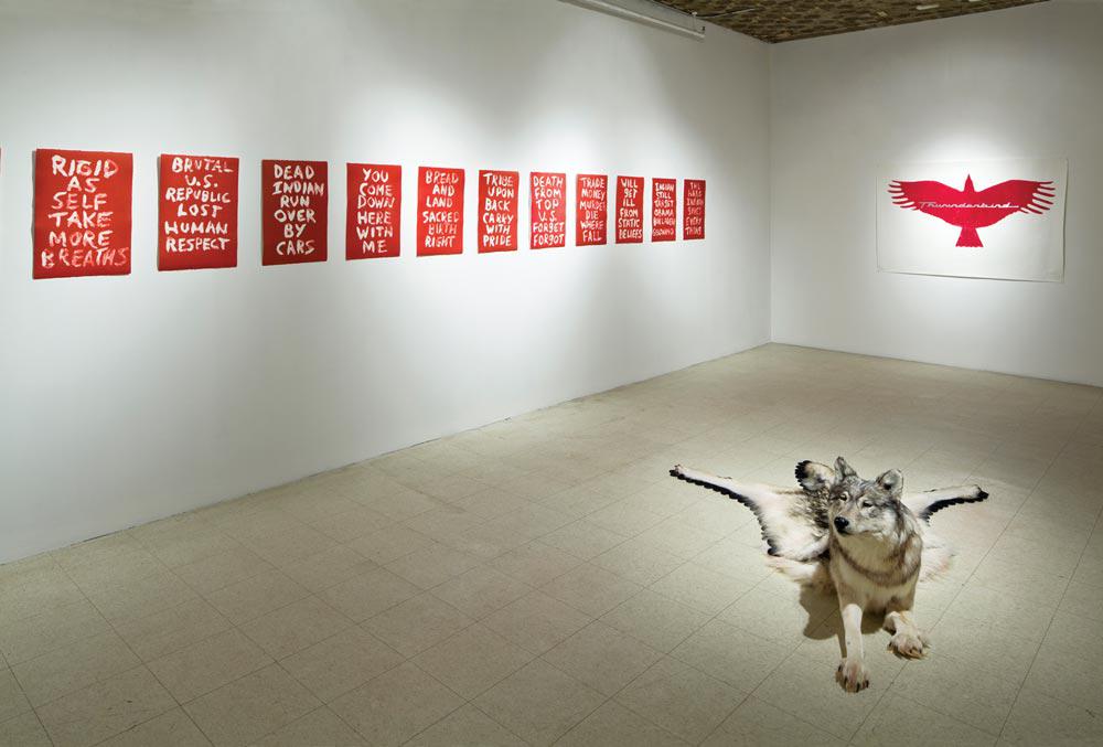 Installation view of “A Stake in the Ground” with (clockwise from left) Edgar Heap of Birds <em>Dead Indian Stories</em> 2011, Tania Willard <em>Thunderbird</em> 2007 and Nicholas Galanin <em>Inert</em> 2009 / photo Guy L'Heureux