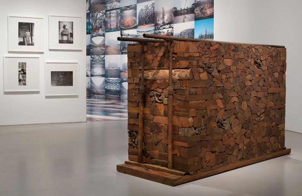 Ai Weiwei (from left) <em>New York Photographs</em> 1983–93, <em>Beijing’s 2008 Olympic Stadium</em> 2005–8 and <em>Kippe</em> 2006 Installation view Courtesy Hirshhorn Museum, Washington / photo Cathy Carver