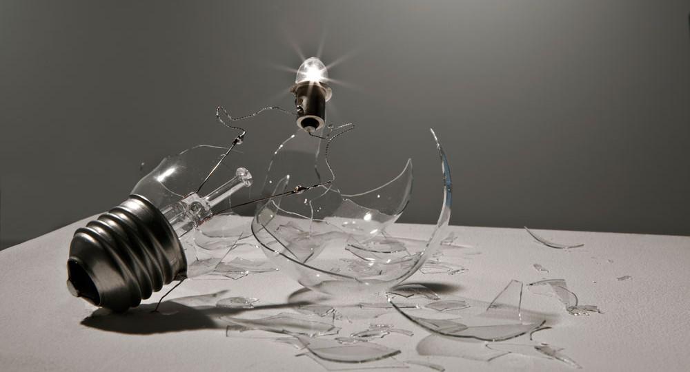 Michel de Broin, 100 watts / 3 watts, 2007–2013 Lightbulb, cable, solder 25 × 25 × 15 cm